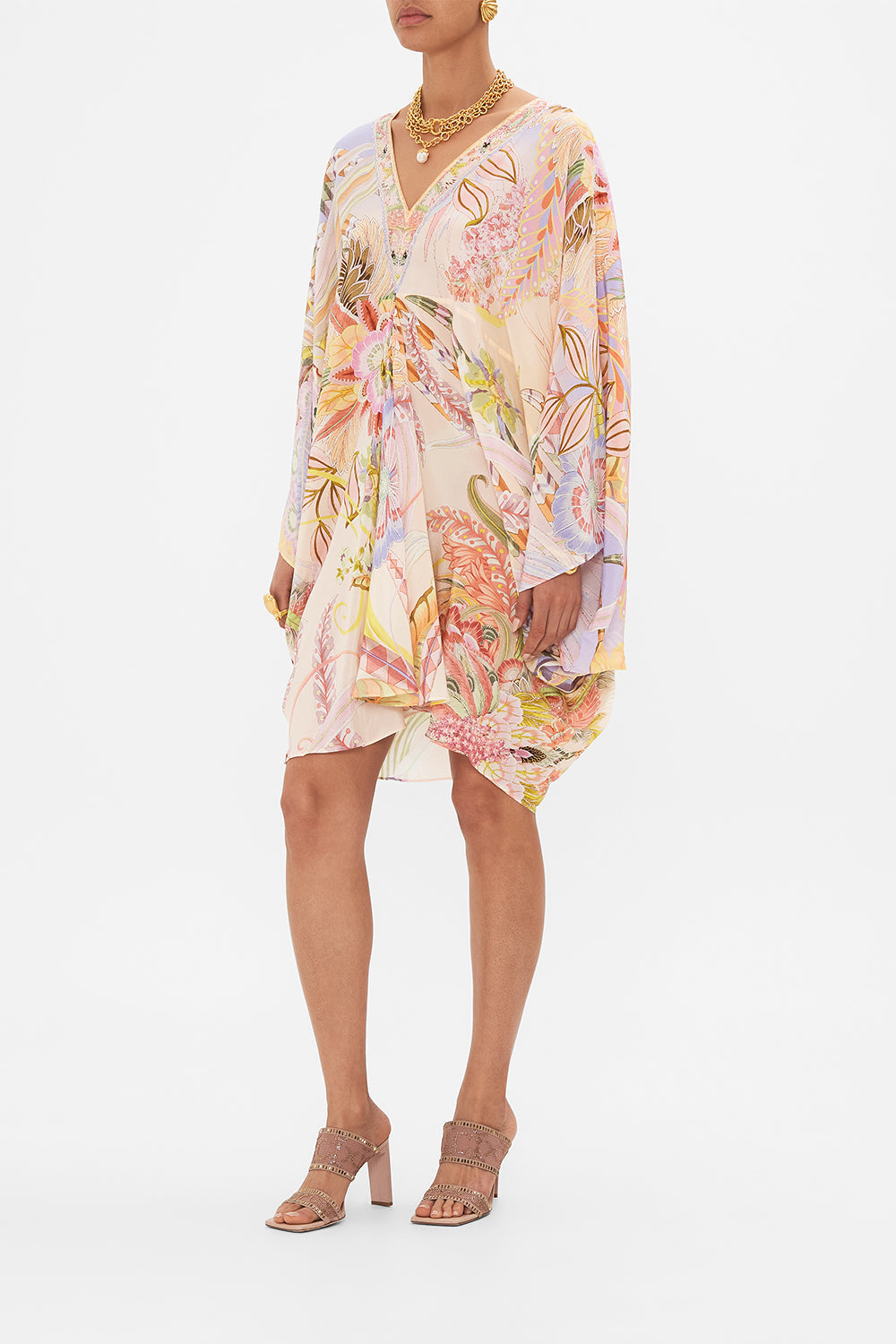 Side view of model wearing CAMILLA silk kaftan in Cosmic Tuscan print