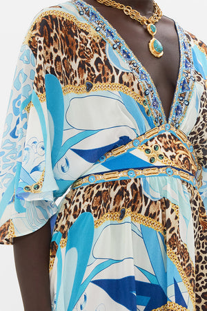 Detail view of model wearing CAMILLA silk mini dress in Sky Cheetah print