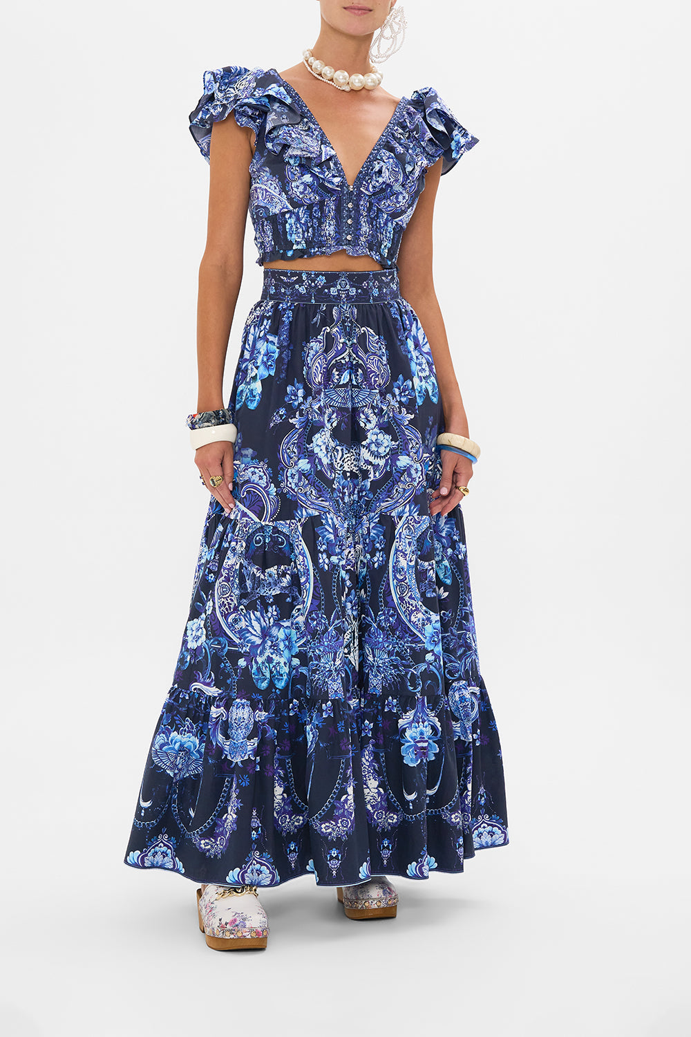 The CAMILLA DEEP V FRILL SHORT SLEEVE TOP DELFT DYNASTY in our DELFT DYNASTY print.