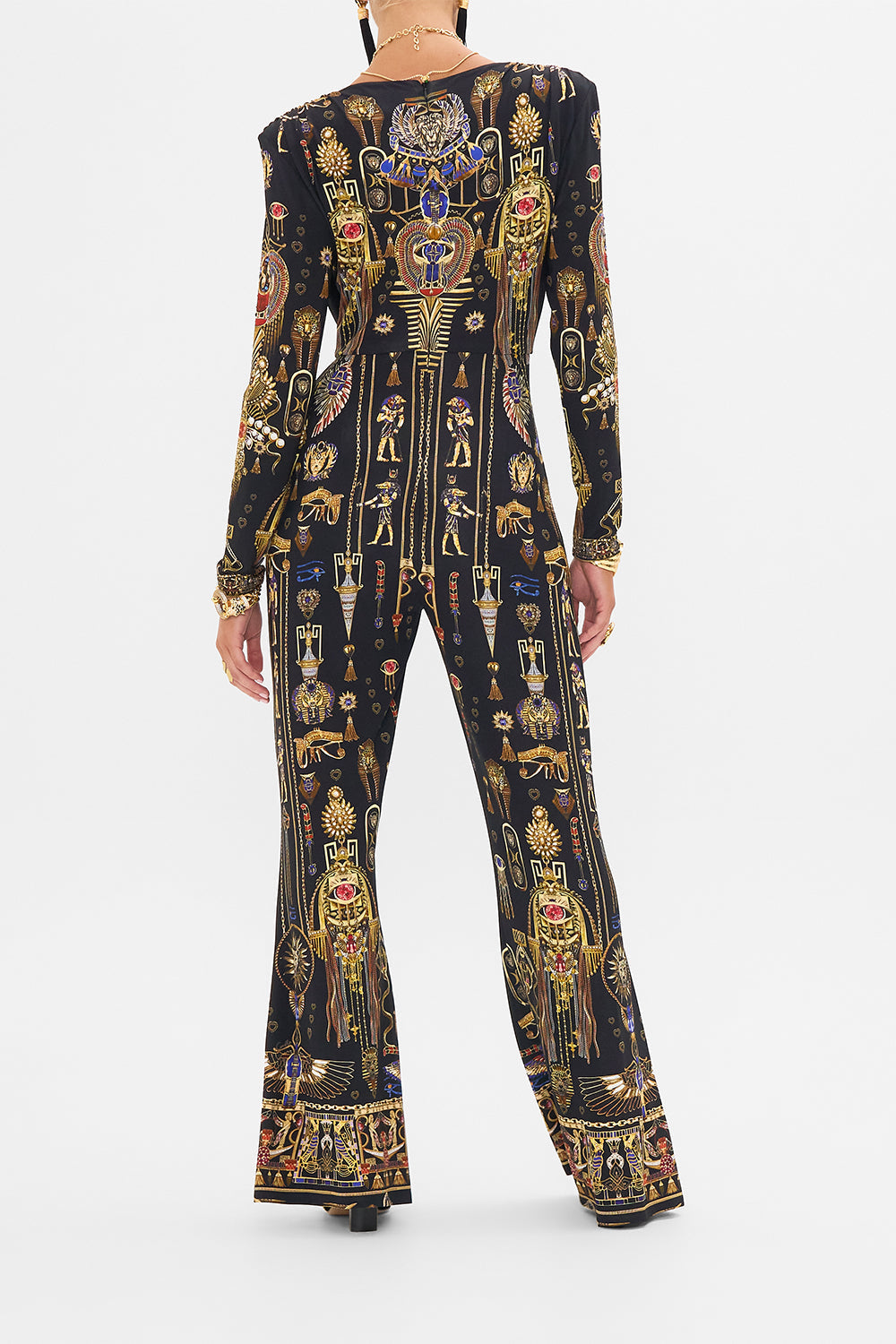 CAMILLA Draped V Neck Jersey Flared Jumpsuit in Cartouche Kingdom print. 