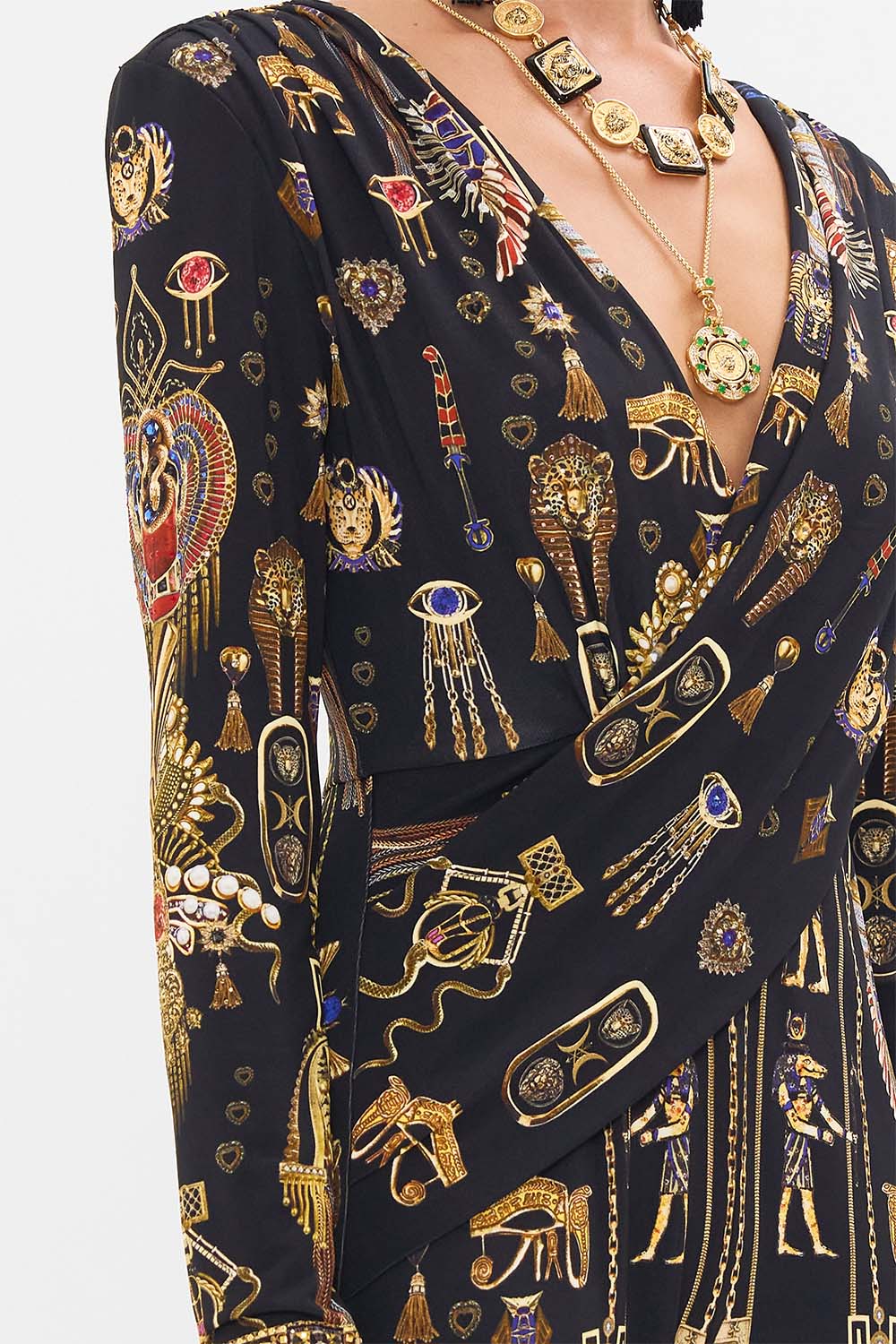 CAMILLA Draped V Neck Jersey Flared Jumpsuit in Cartouche Kingdom print. 