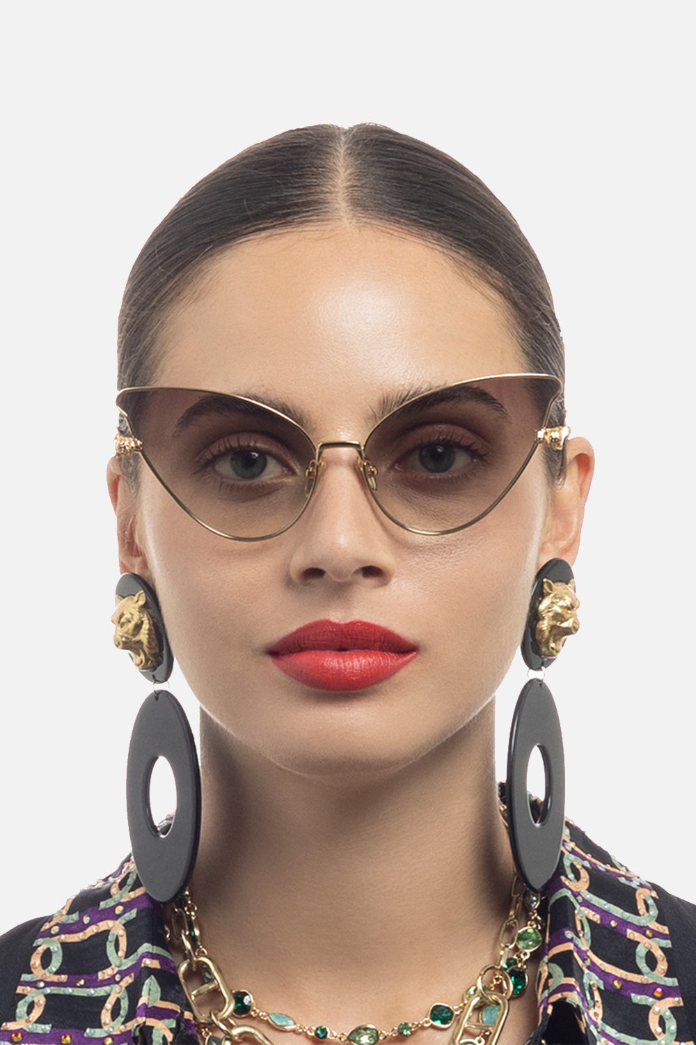 The CAMILLA HEAD IN THE CLOUDS SUNGLASSES GOLD / NUDE in our  print.
