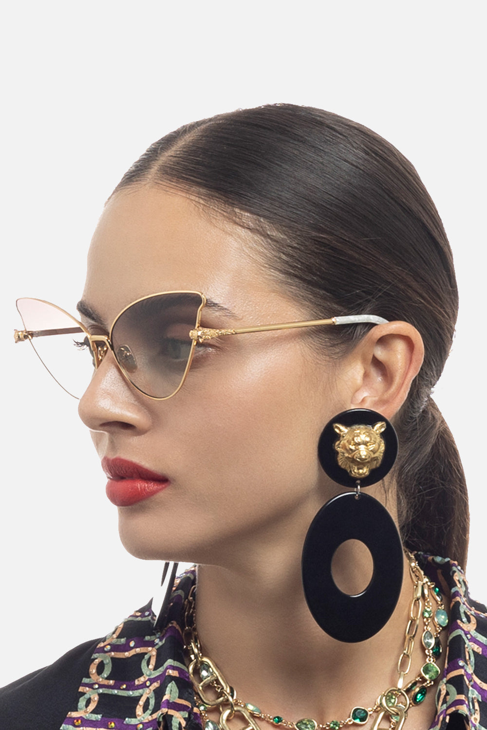 The CAMILLA HEAD IN THE CLOUDS SUNGLASSES GOLD / NUDE in our  print.