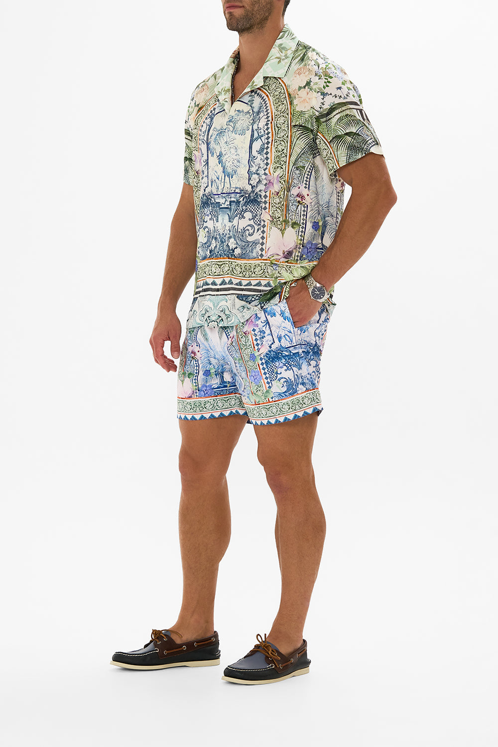 The CAMILLA MID LENGTH BOARDSHORT JARDIM PARTY in our  print.