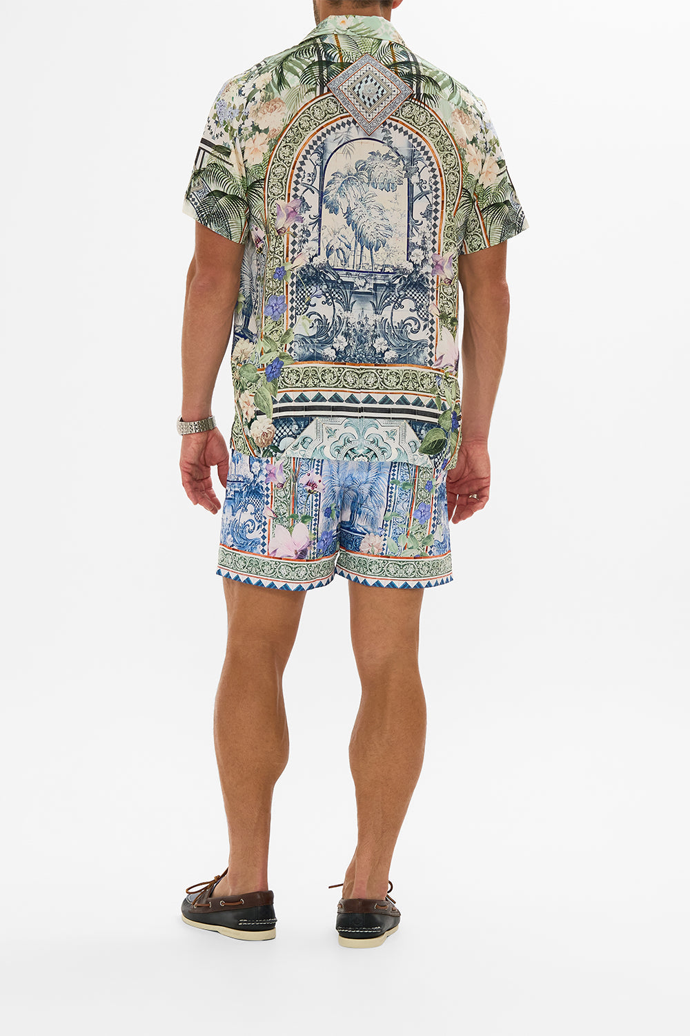 The CAMILLA MID LENGTH BOARDSHORT JARDIM PARTY in our  print.