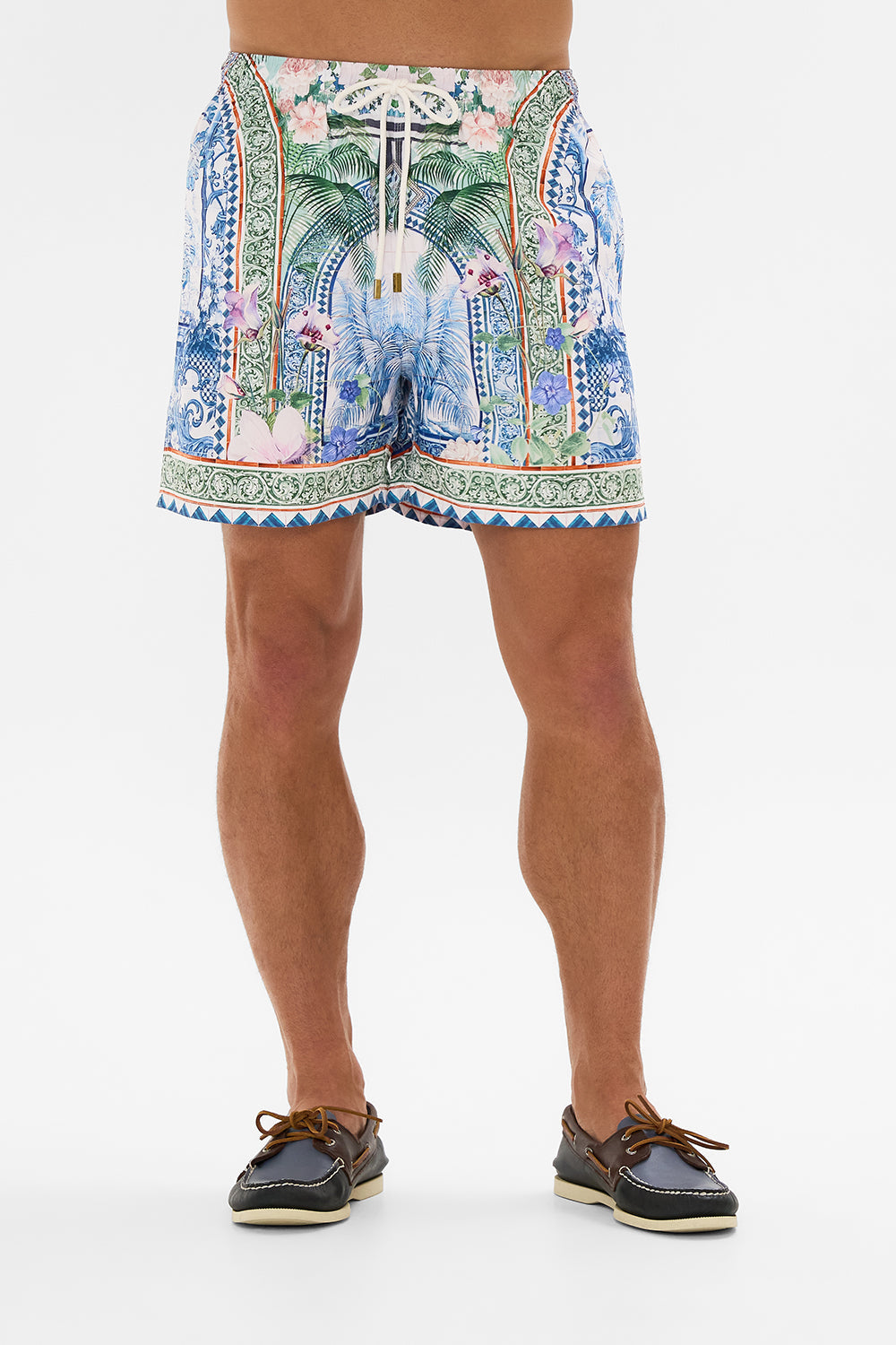 The CAMILLA MID LENGTH BOARDSHORT JARDIM PARTY in our  print.