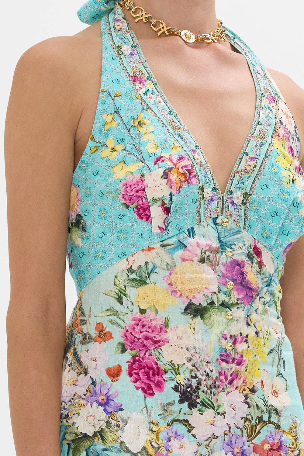 The CAMILLA BUTTON FRONT HALTER PLAYSUIT GARDENS OF QUELUZ in our  print.
