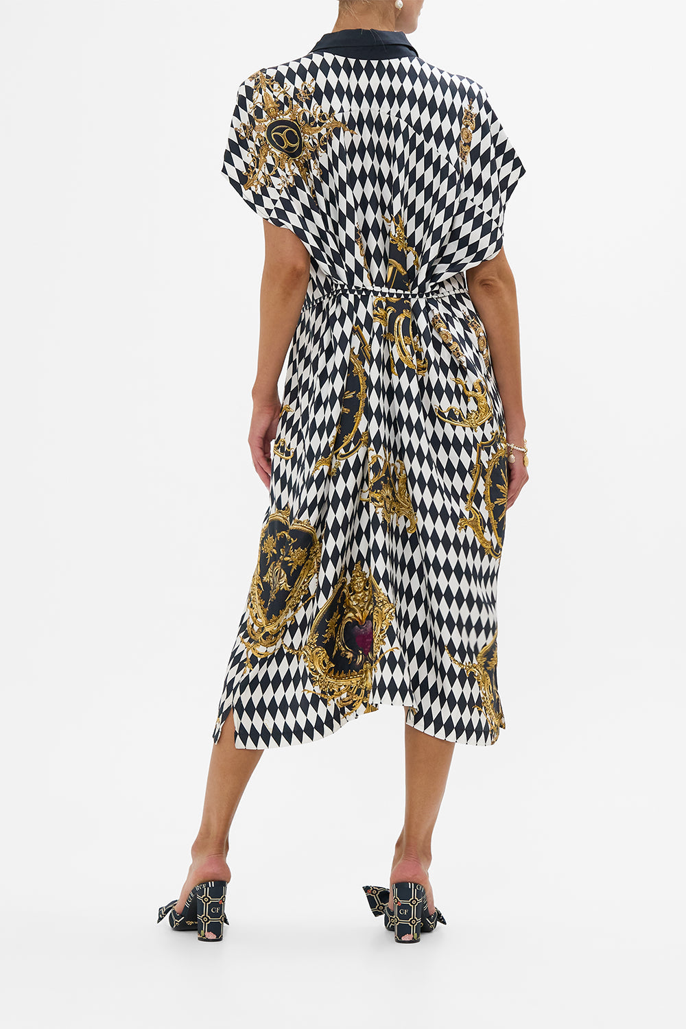 The CAMILLA SLEEVELESS SHIRTDRESS MONARCHY MANIA in our  print.