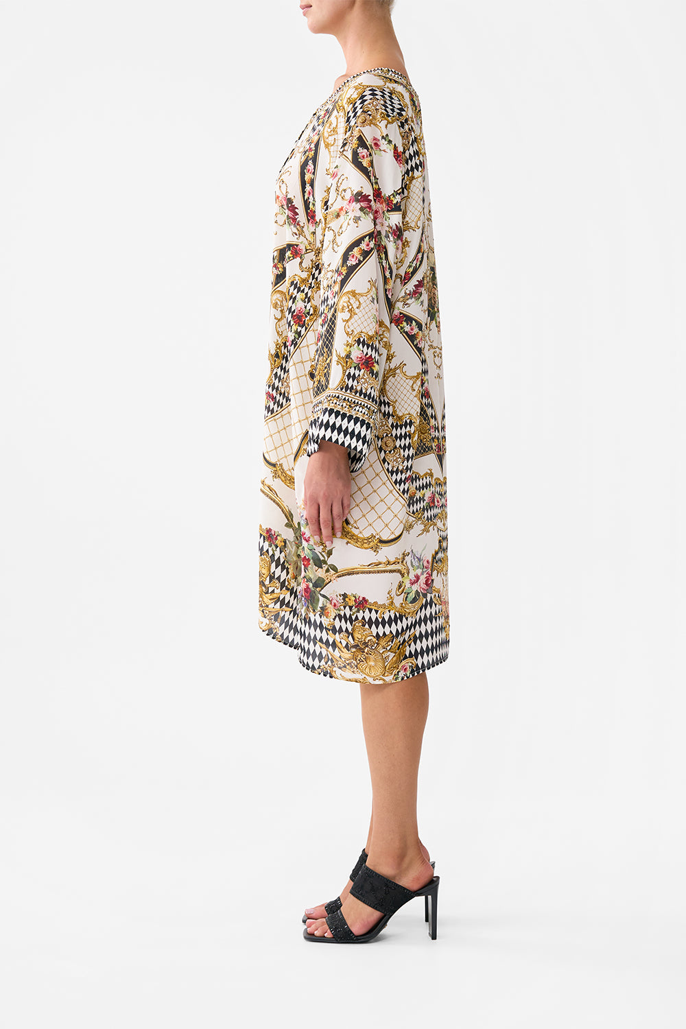 The CAMILLA METAL EYELET KAFTAN ROCOCO GLOW in our  print.