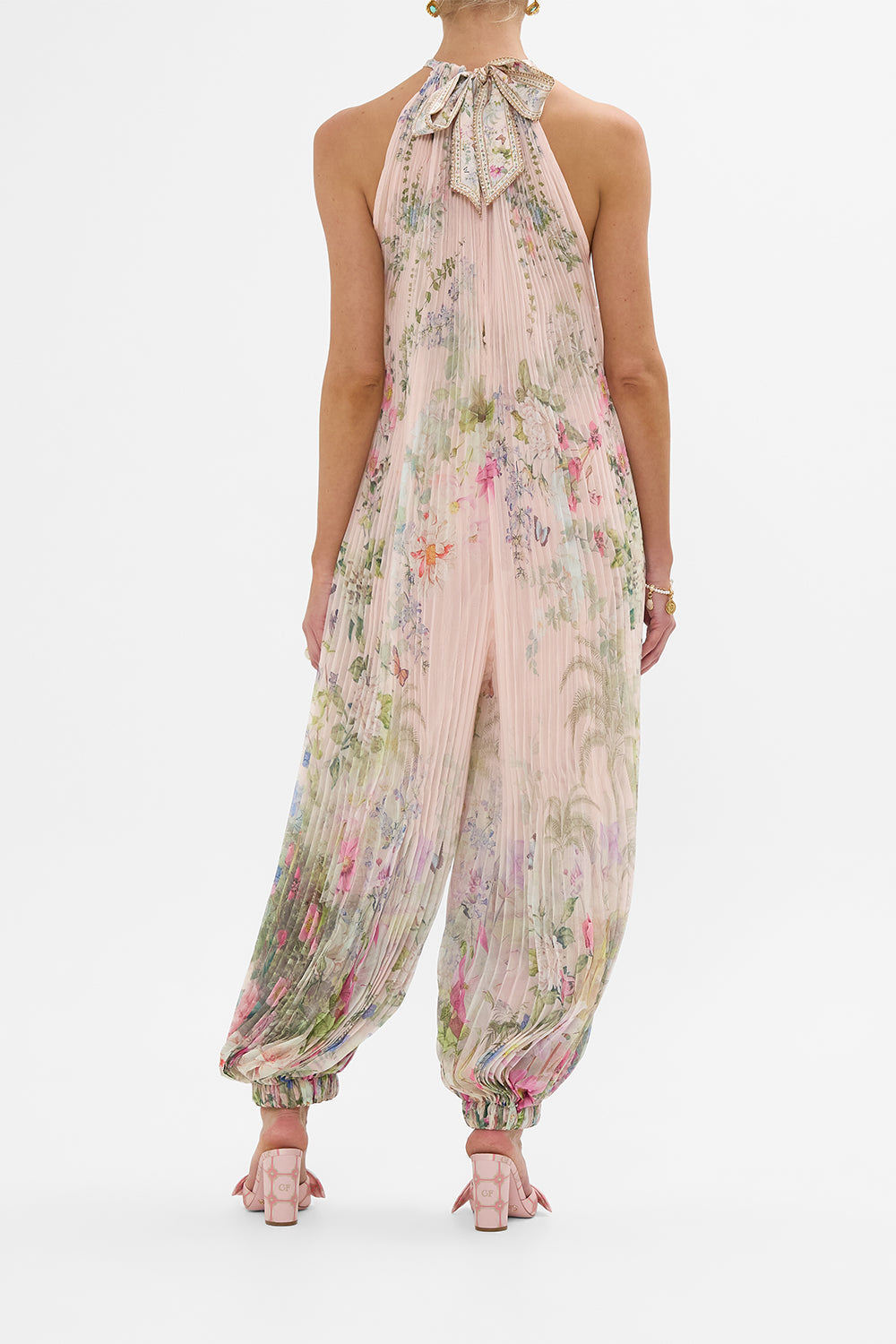 The CAMILLA PLISSE JUMPSUIT WITH NECK TIE PALACIO PLAYGROUND in our  print.