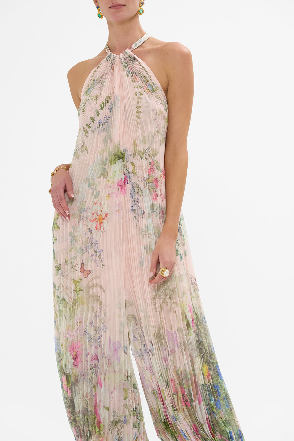 The CAMILLA PLISSE JUMPSUIT WITH NECK TIE PALACIO PLAYGROUND in our  print.
