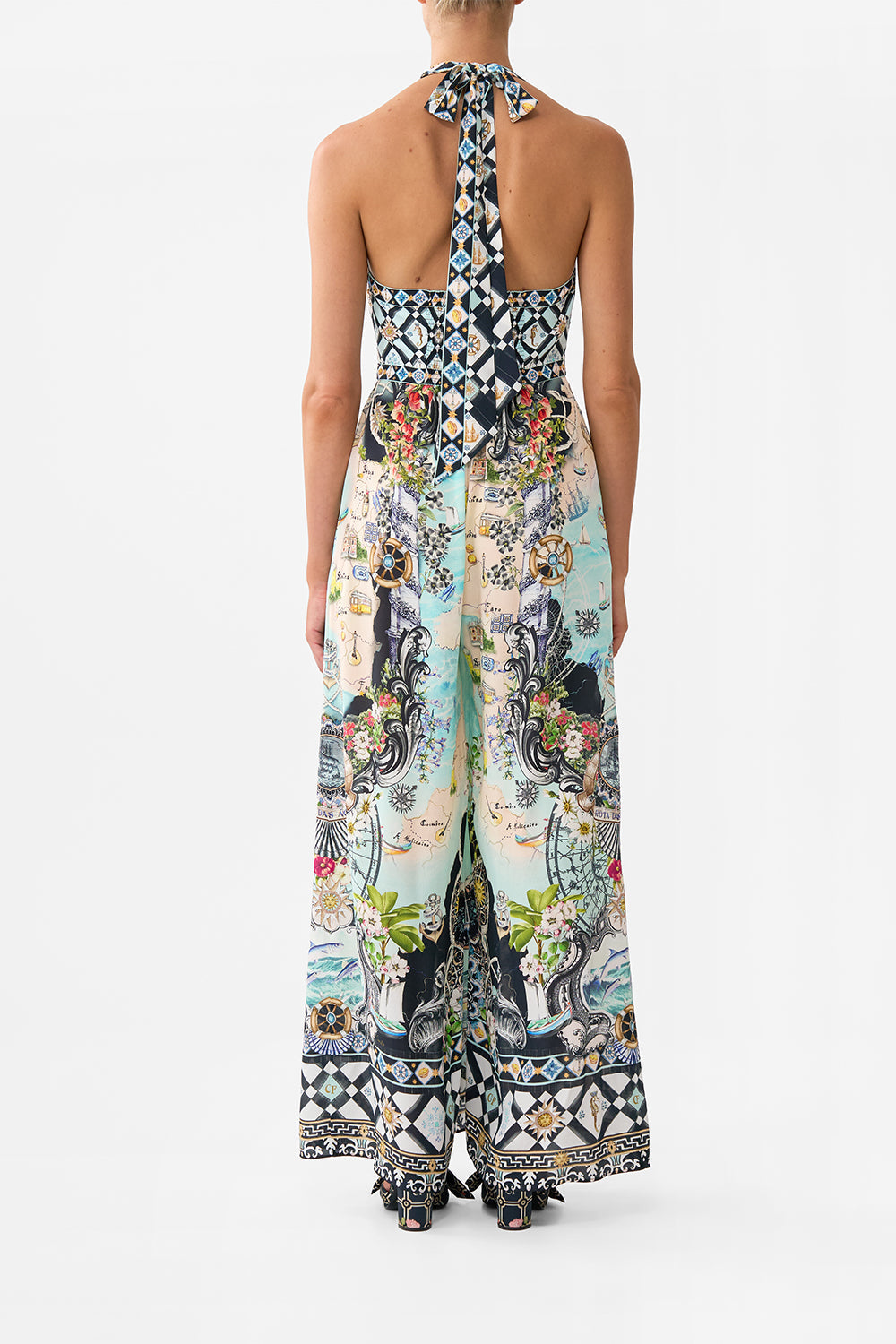 The CAMILLA Halterneck Jumpsuit With Tie Neck in our Folk Afloat print.
