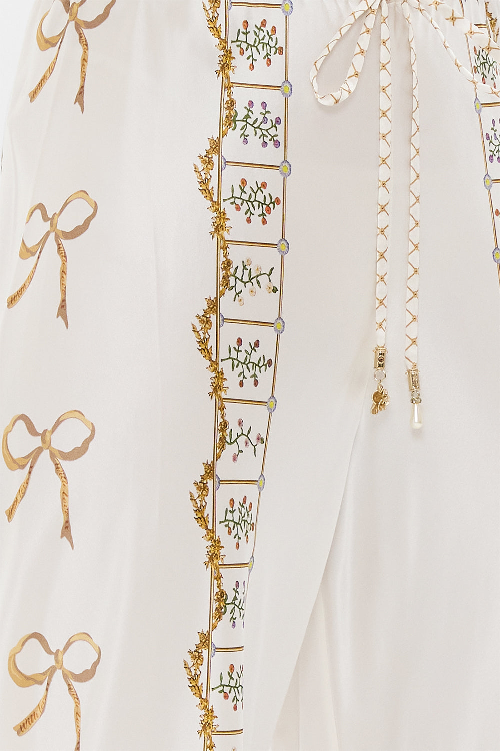 The CAMILLA Bias Cut Drawstring Pant in our Dressing Room Drama print.