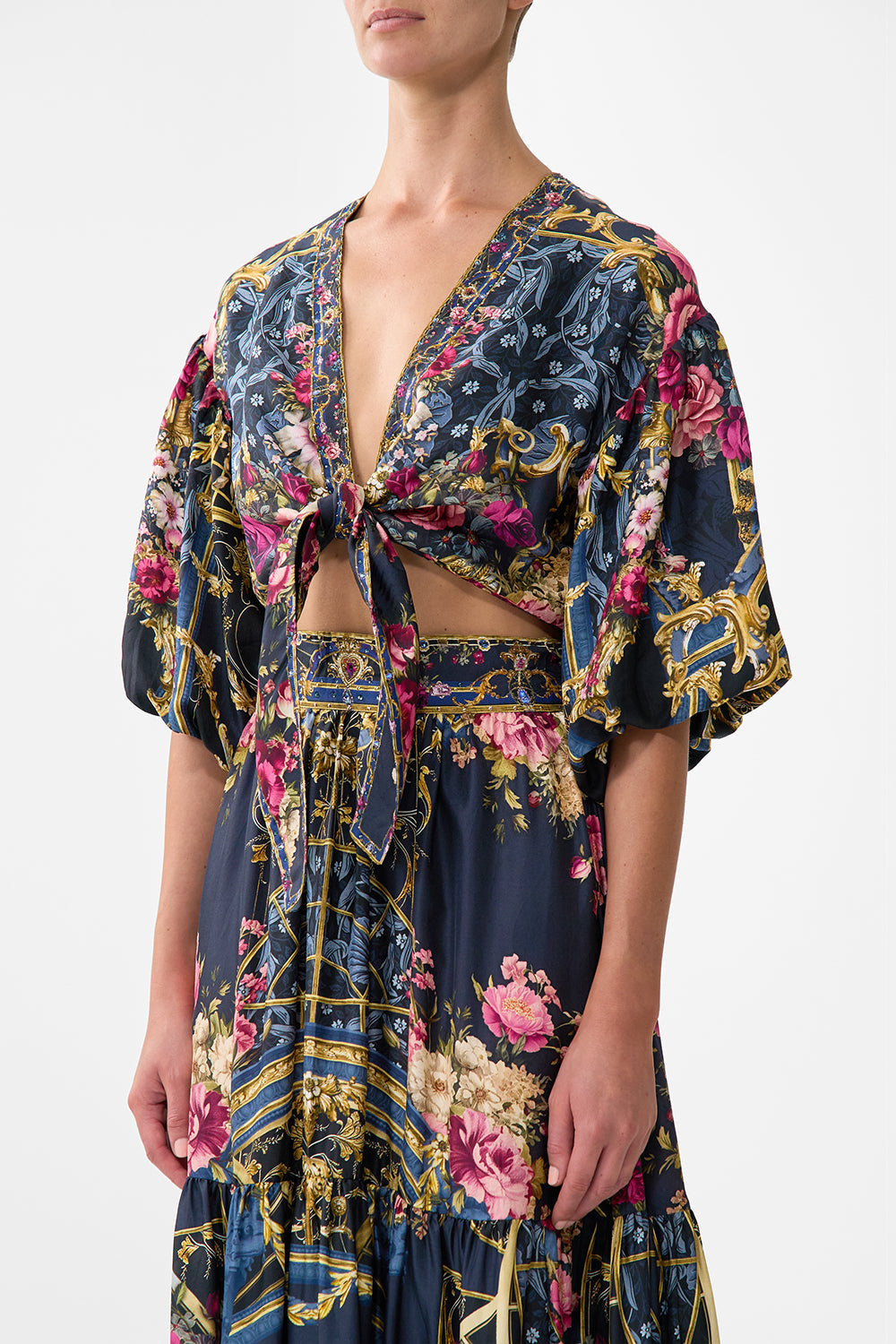 The CAMILLA TIE FRONT PUFF SLEEVE TOP ORNATE ON A PLATE in our  print.