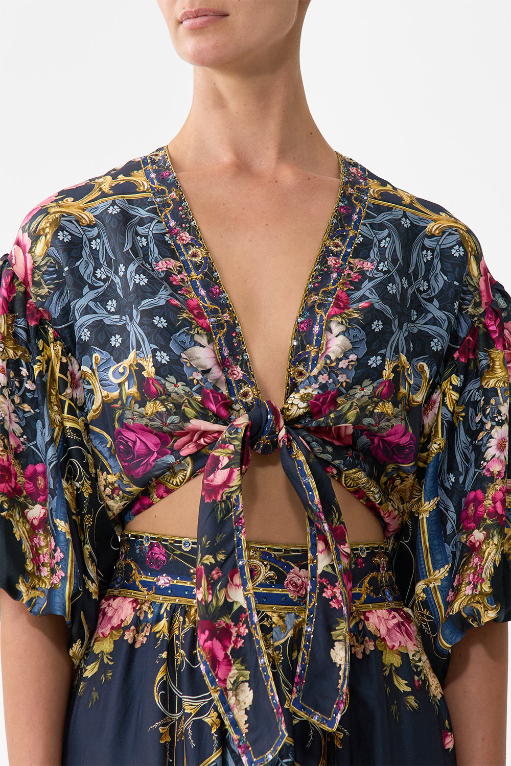 The CAMILLA TIE FRONT PUFF SLEEVE TOP ORNATE ON A PLATE in our  print.