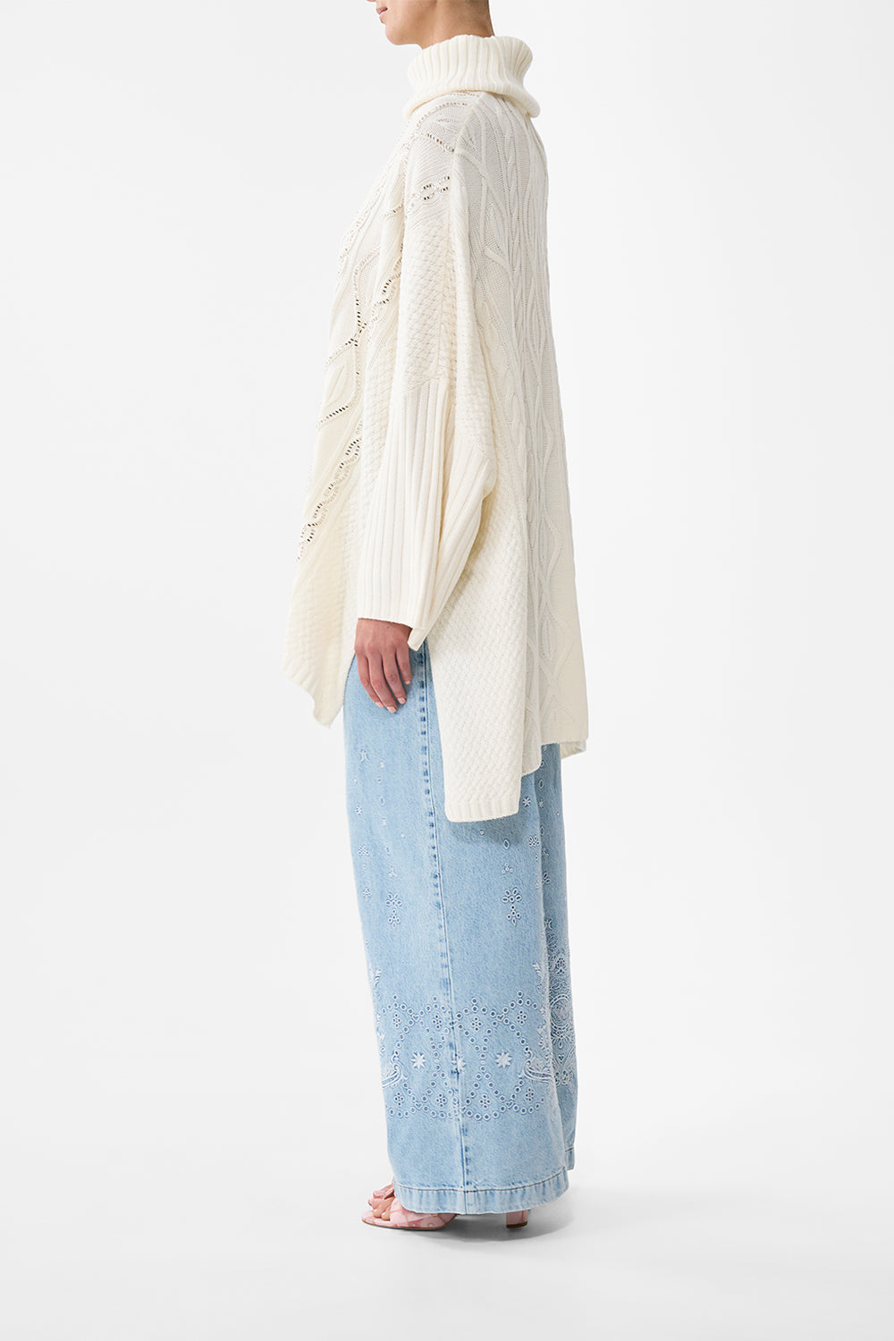 The CAMILLA Roll Neck Knit Jumper in our Solid Ivory print.