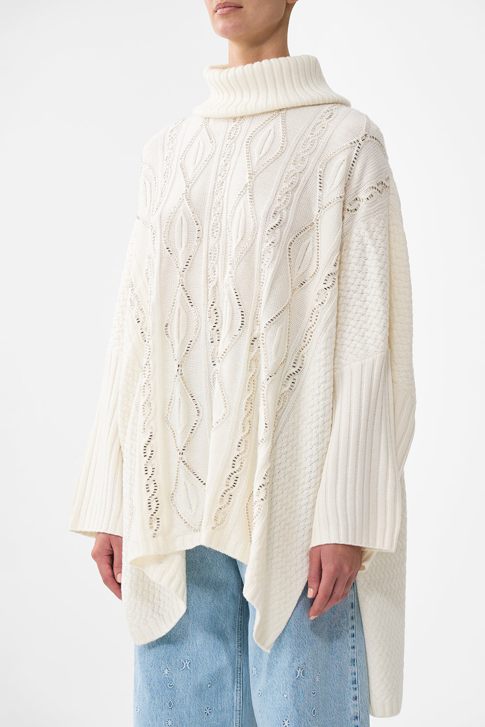 The CAMILLA Roll Neck Knit Jumper in our Solid Ivory print.