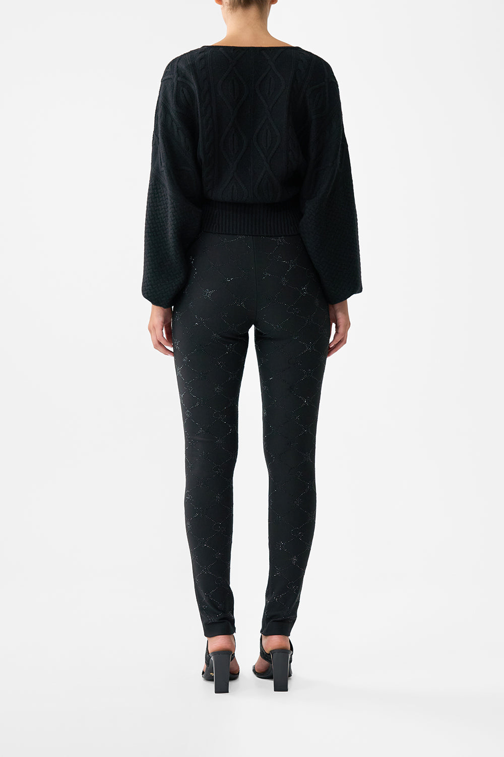 The CAMILLA SURPLICE NECK KNIT JUMPER SOLID BLACK in our  print.