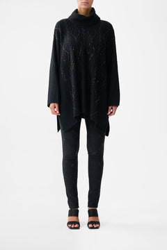 The CAMILLA Roll Neck Knit Jumper in our Solid Black print.