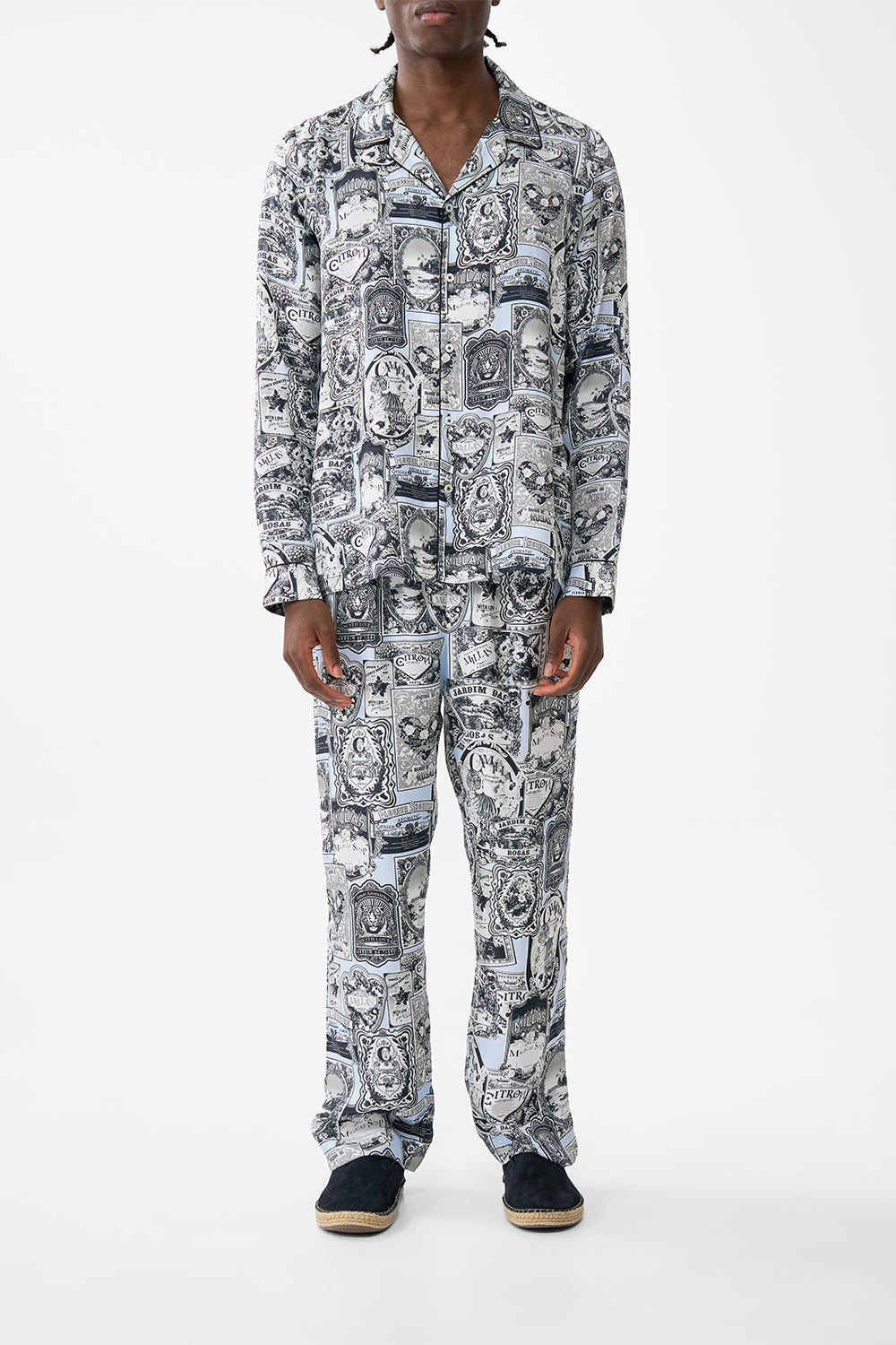 The CAMILLA LONG SLEEVE CAMP COLLARED SHIRT FLOWER SHOWERS in our FLOWER SHOWERS print.