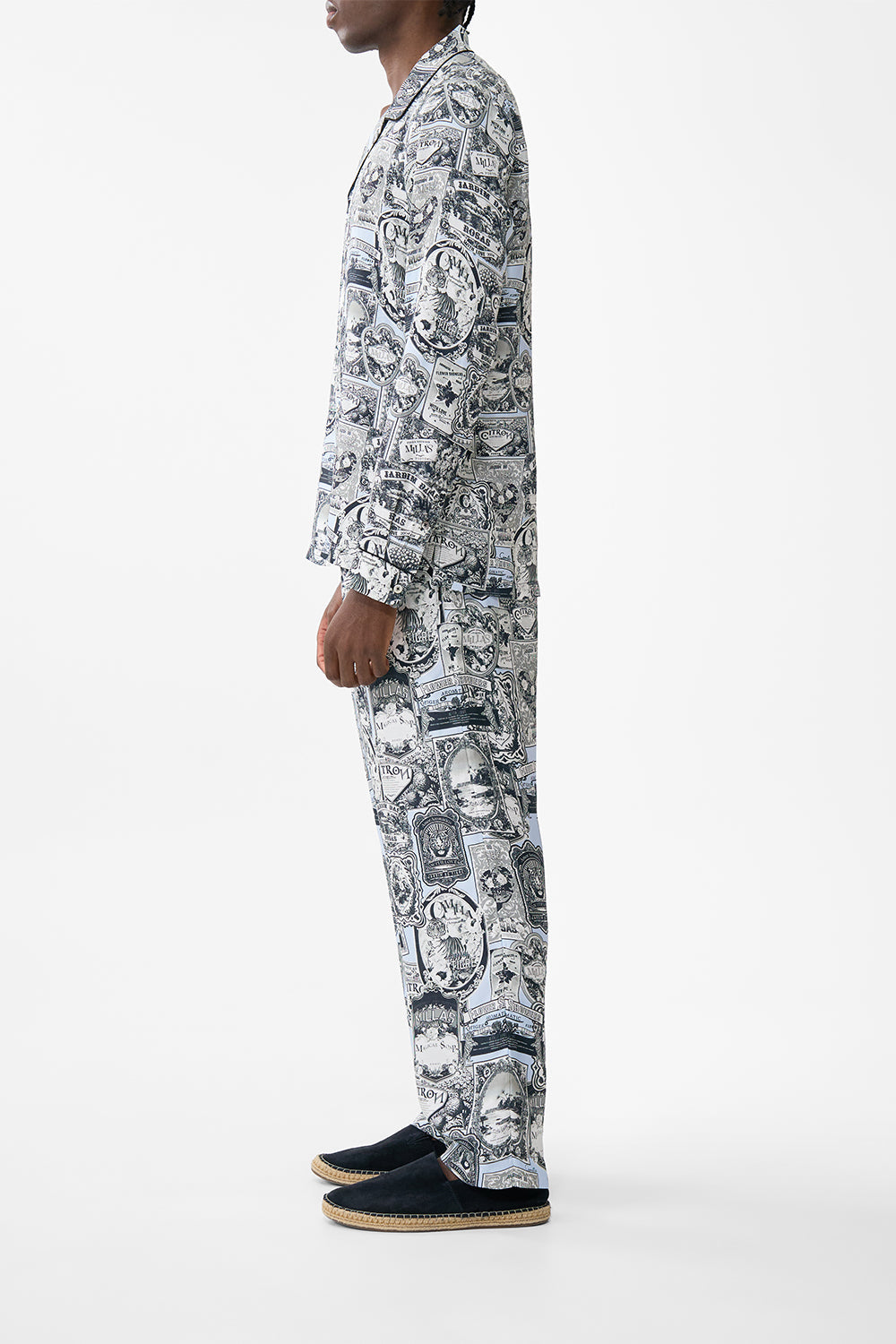 The CAMILLA LONG SLEEVE CAMP COLLARED SHIRT FLOWER SHOWERS in our  print.