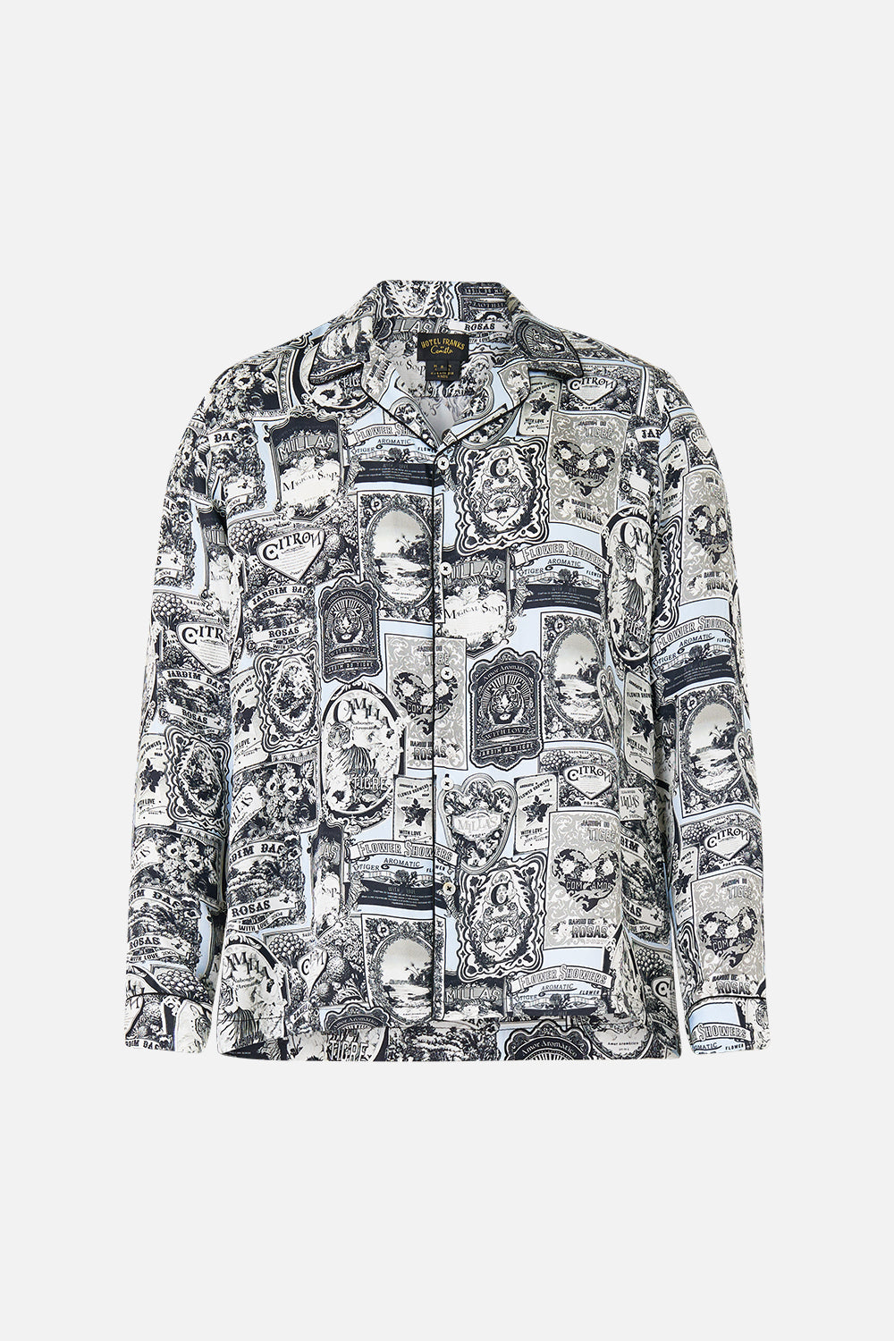 The CAMILLA LONG SLEEVE CAMP COLLARED SHIRT FLOWER SHOWERS in our  print.