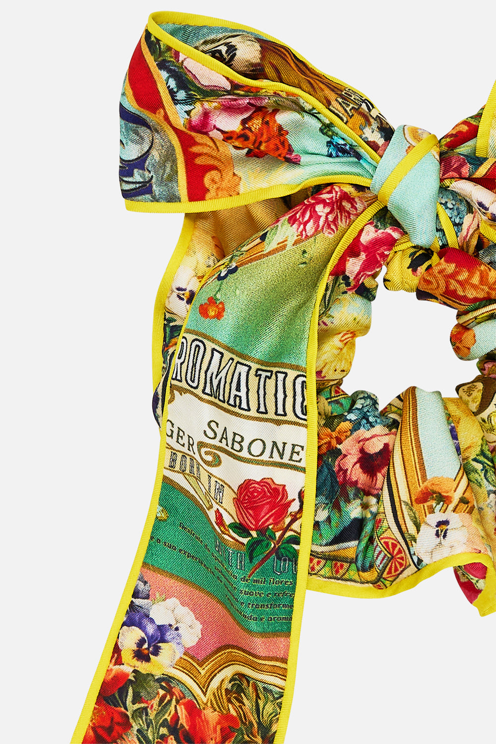 The CAMILLA Scrunchie With Bow in our Aromatic Tiger Flower print.