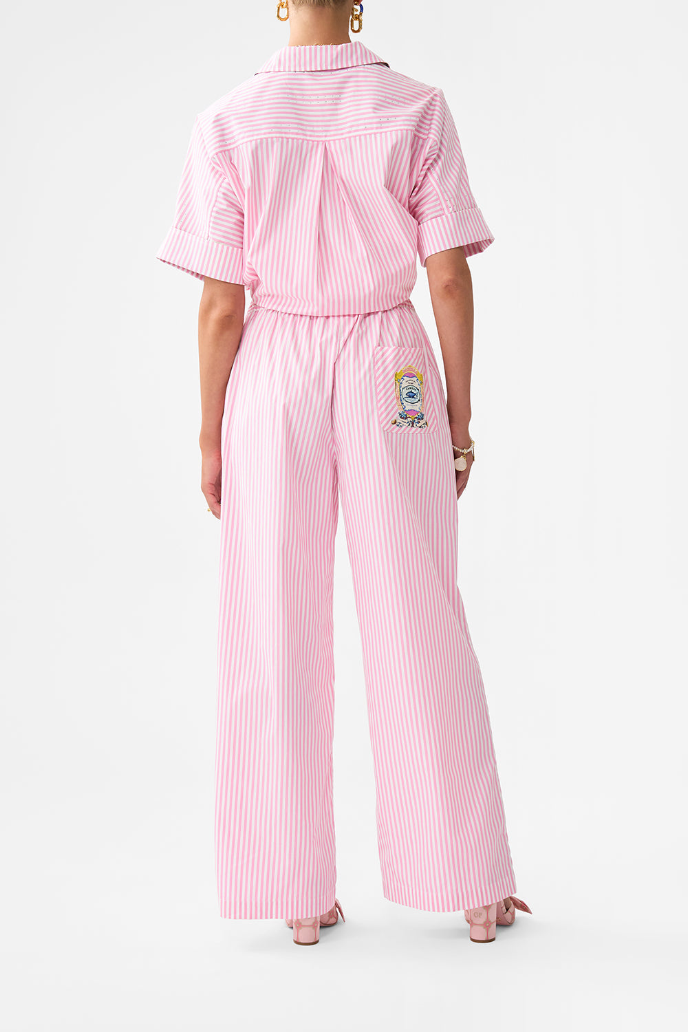 The CAMILLA BUTTON FRONT LOUNGE PANT SALTY SPLENDOUR in our  print.