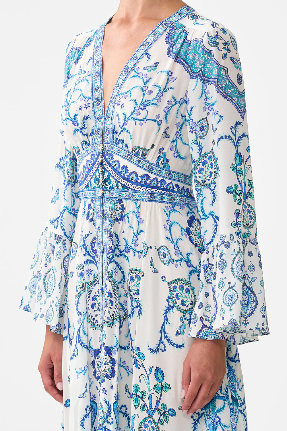 The CAMILLA shaped waistband dress with ruffle sleeve from our print Isnik lullaby