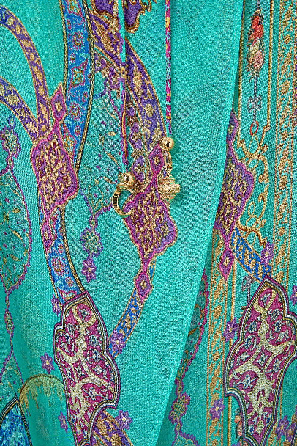 The CAMILLA mini dress with long overlay from our print the concubines corridor