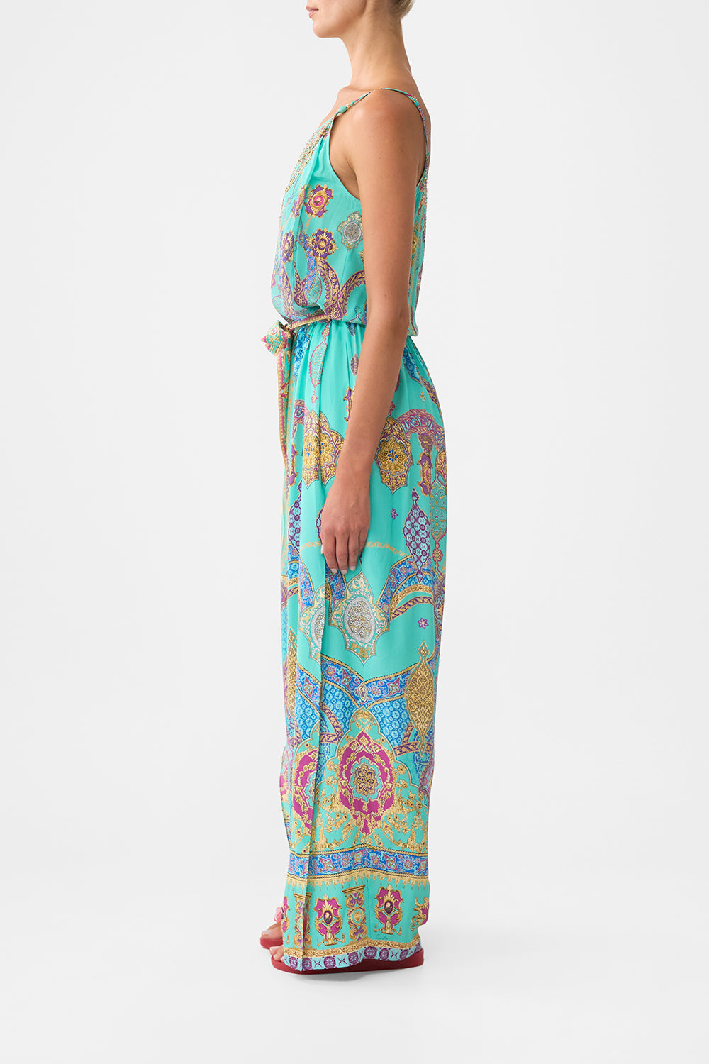 The CAMILLA shoestring strap jumpsuit from our print the concubines corridor