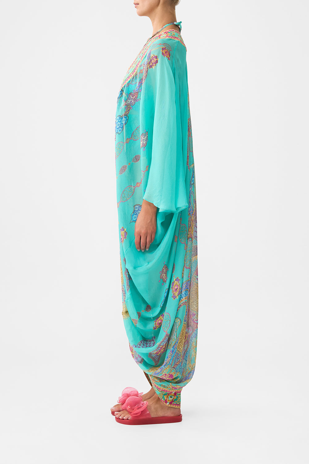 The CAMILLA long sleeve long cape from our print the concubines corridor