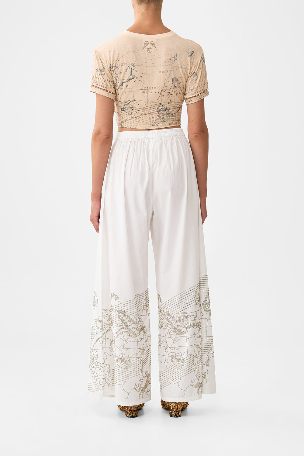 The CAMILLA JERSEY T-SHIRT WITH HARDWARE HOUSE OF HOROSCOPES in our  print.