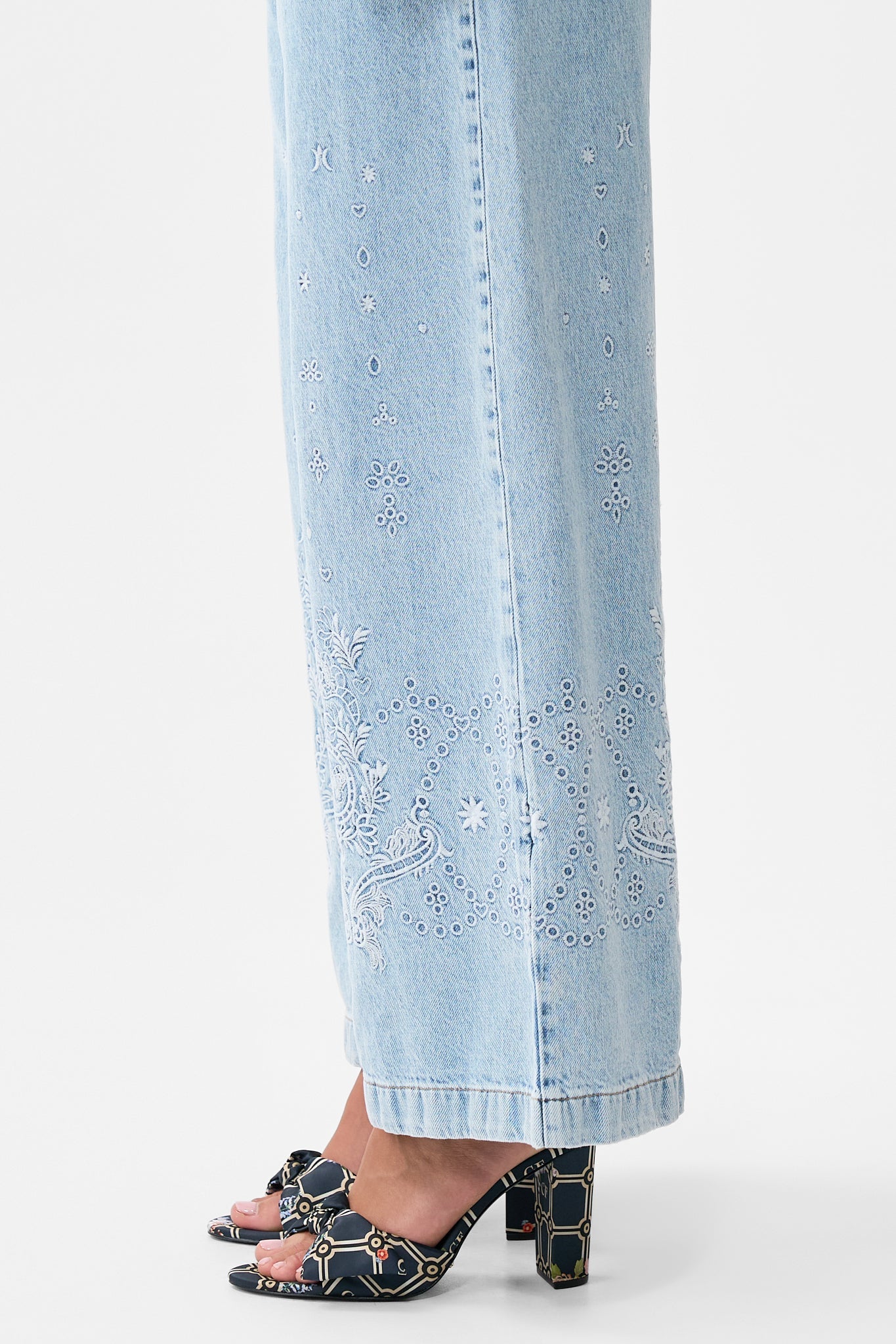 The CAMILLA LUNA KITSCH STITCH HIGH RISE WIDE LEG JEAN DENIM in our  print.