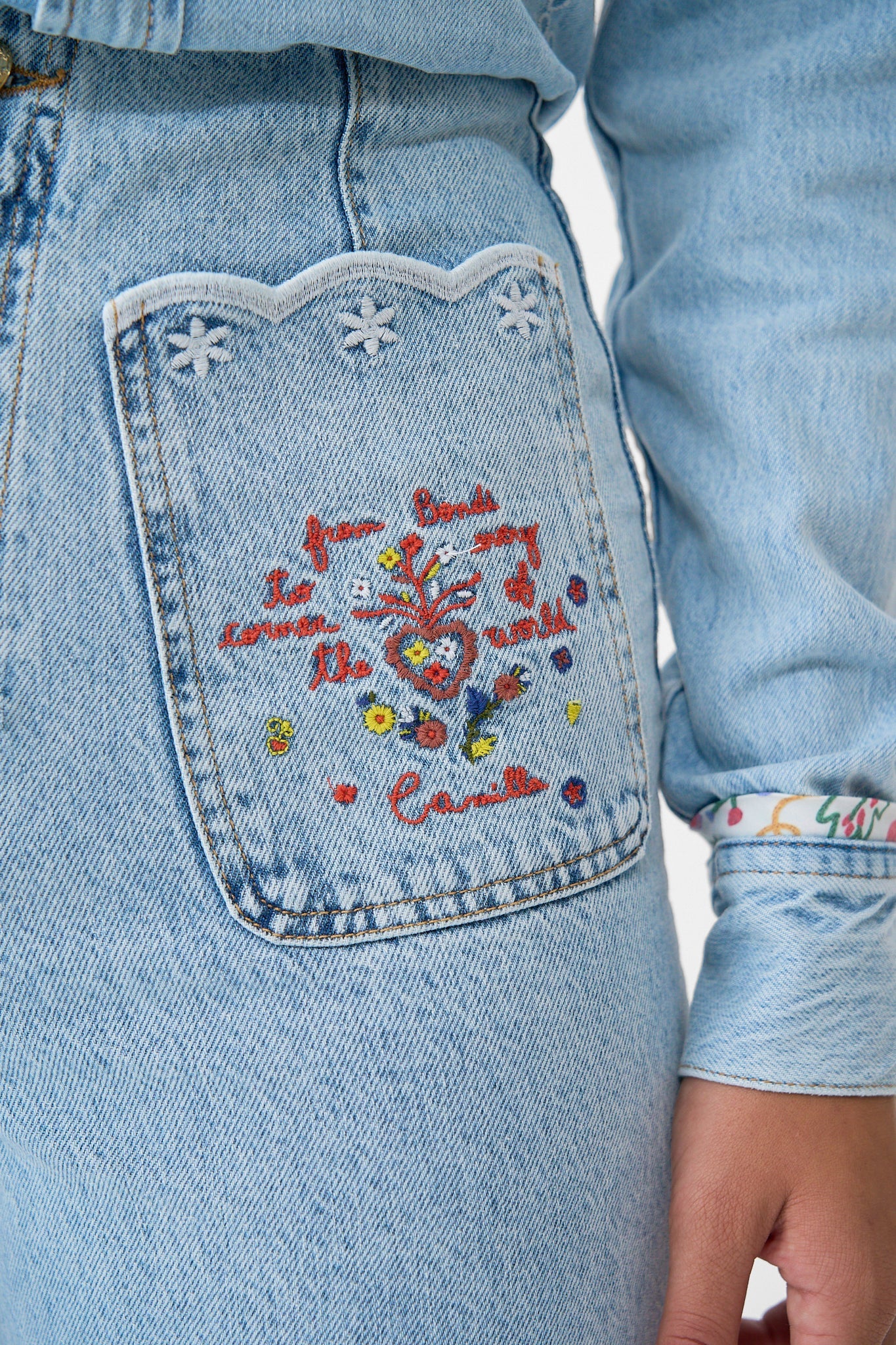 The CAMILLA LUNA KITSCH STITCH HIGH RISE WIDE LEG JEAN DENIM in our  print.