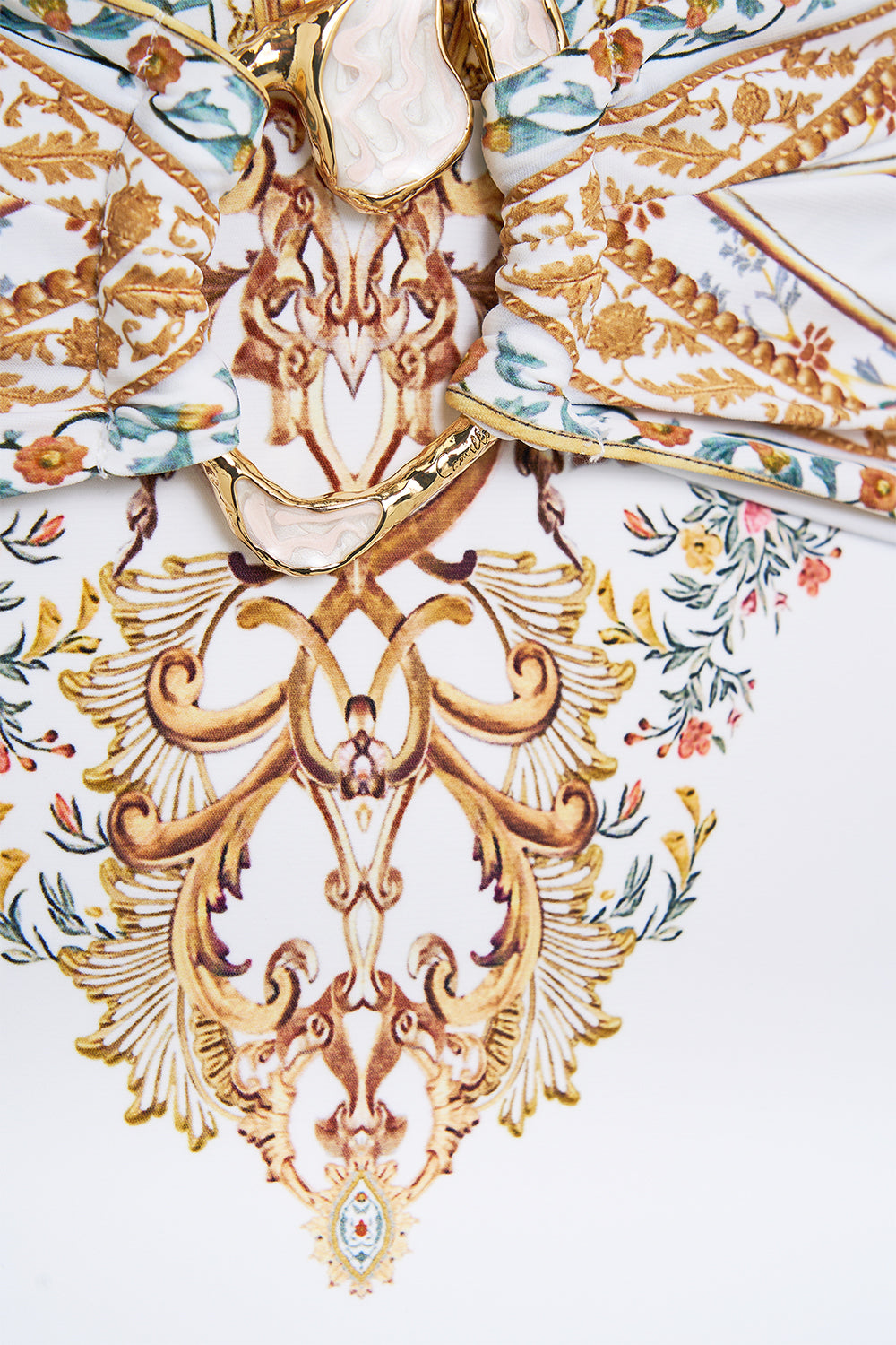 The CAMILLA plunge halter one piece with pleated waist trim from our print Ottoman dynasty