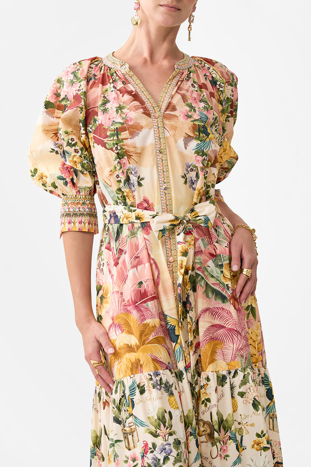 The CAMILLA TIERED SHIRT DRESS WITH SHORT SLEEVE WELCOME TO THE WHITE LOTUS in our  print.