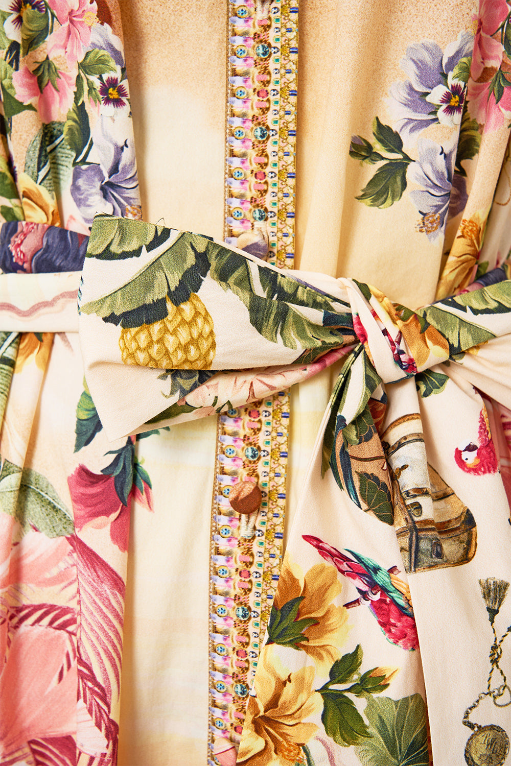 The CAMILLA TIERED SHIRT DRESS WITH SHORT SLEEVE WELCOME TO THE WHITE LOTUS in our  print.