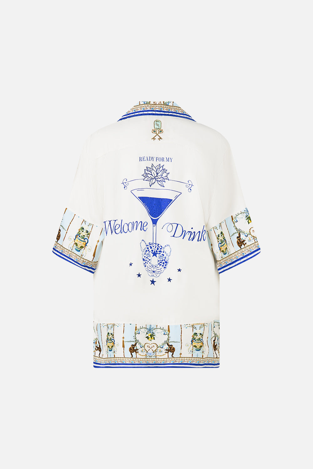 CAMISA ANCHA CON LA VENUS DE BOLSILLO EN UNA VESPA