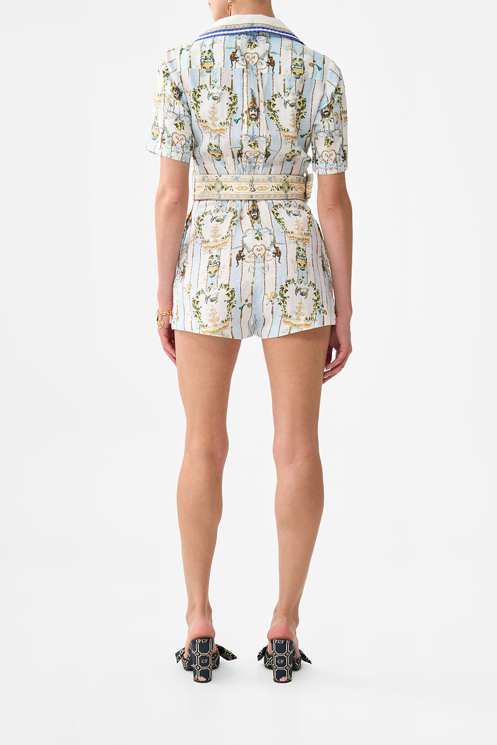 The CAMILLA POCKET PLAYSUIT VENUS ON A VESPA in our  print.