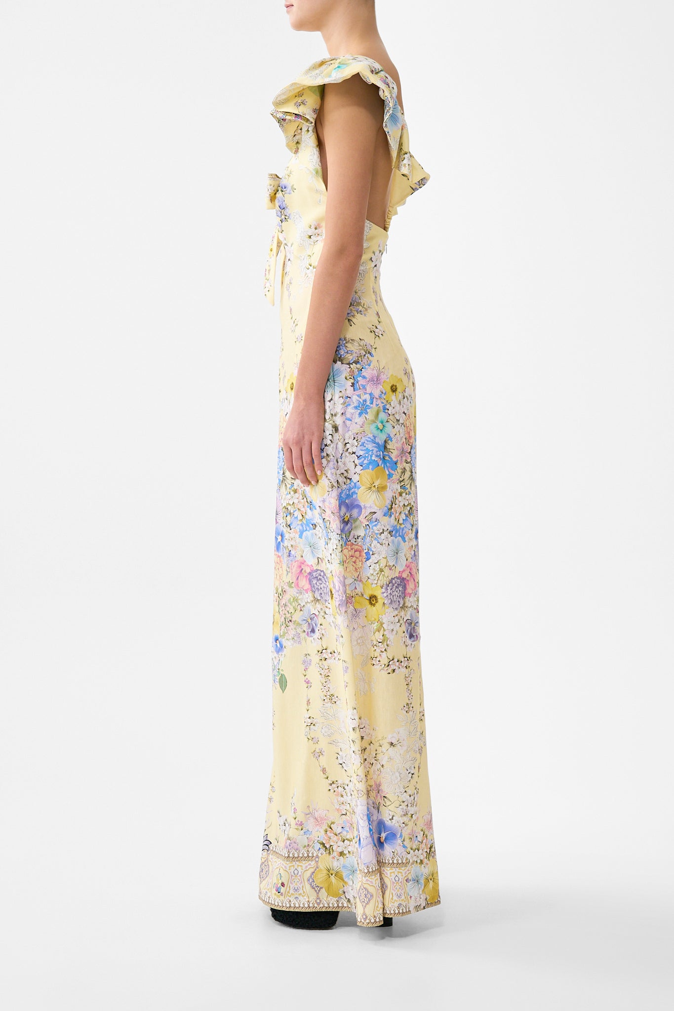 The CAMILLA TIE FRONT FRILL SLEEVE JUMPSUIT DARLING BUDS in our  print.