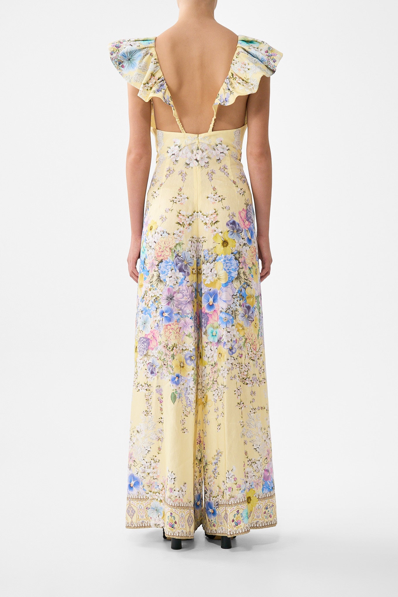 The CAMILLA TIE FRONT FRILL SLEEVE JUMPSUIT DARLING BUDS in our  print.