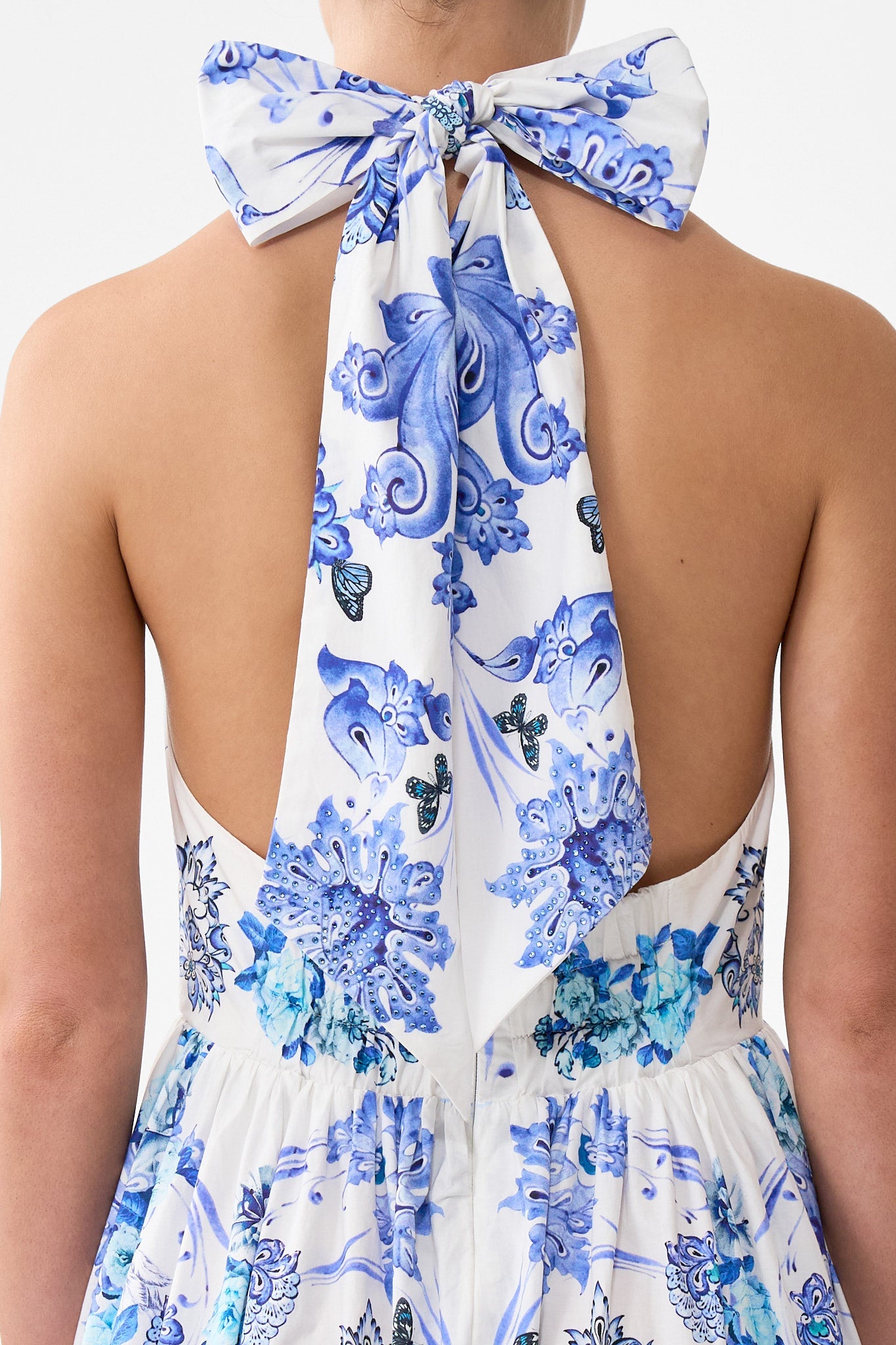The CAMILLA RUFFLE HEM HALTER DRESS ALL ABOUT THAT LACE in our  print.