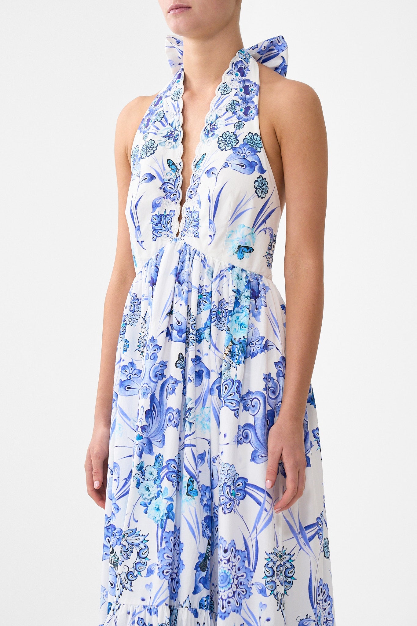 The CAMILLA RUFFLE HEM HALTER DRESS ALL ABOUT THAT LACE in our  print.