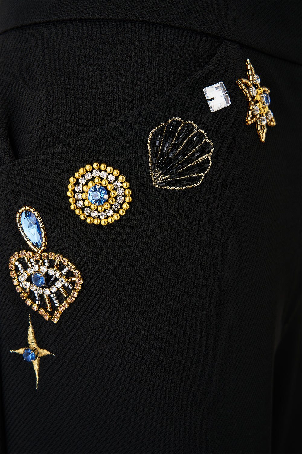 The CAMILLA flare trouser with seam detail from our print amulets and alchemy