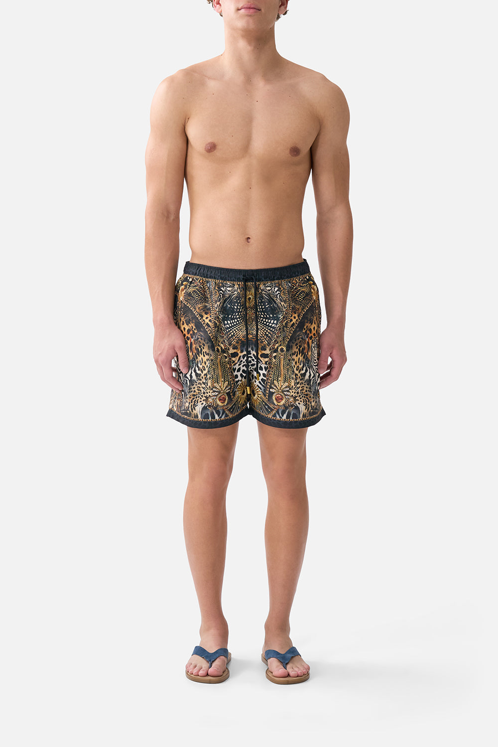 The CAMILLA mid length boardshort with elastic waist from our print feline folklore, front model view