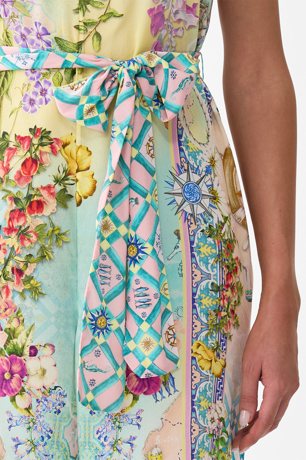 The CAMILLA TIE WAIST STRAPLESS JUMPSUIT JUST COASTING in our  print.