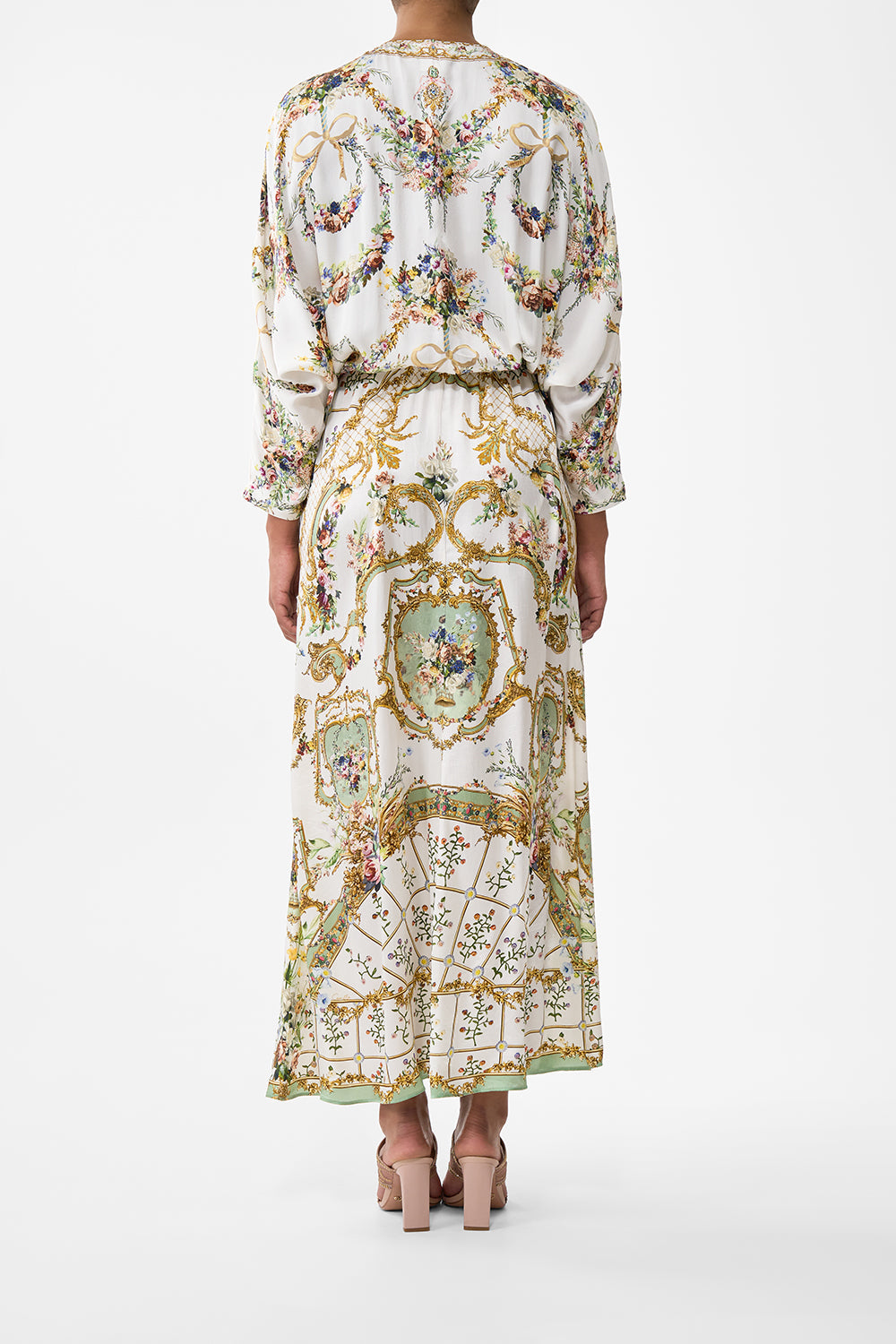 The CAMILLA TWIST FRONT BATWING DRESS DRESSING ROOM DRAMA in our  print.