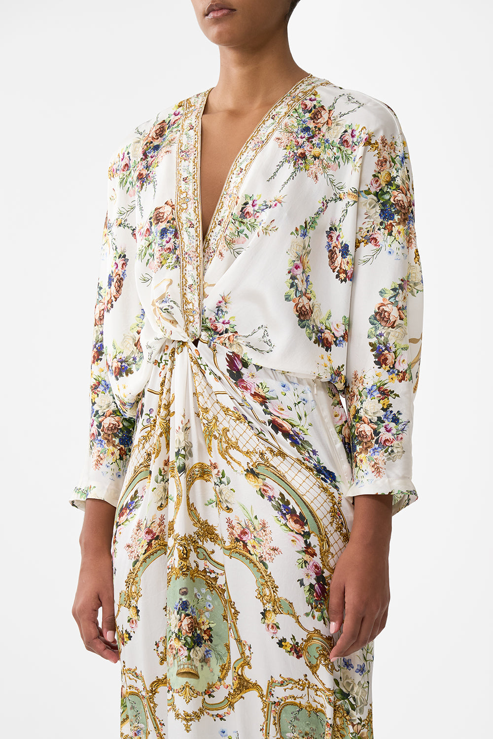 The CAMILLA TWIST FRONT BATWING DRESS DRESSING ROOM DRAMA in our  print.