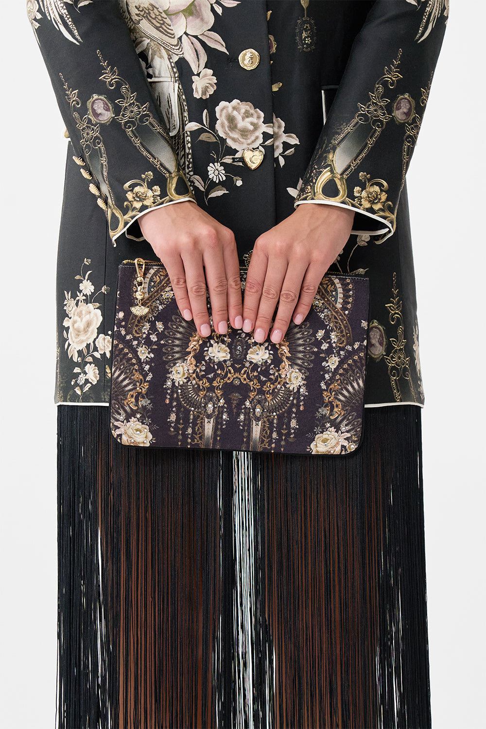 The CAMILLA small canvas clutch in our print Flamenco Folklore.